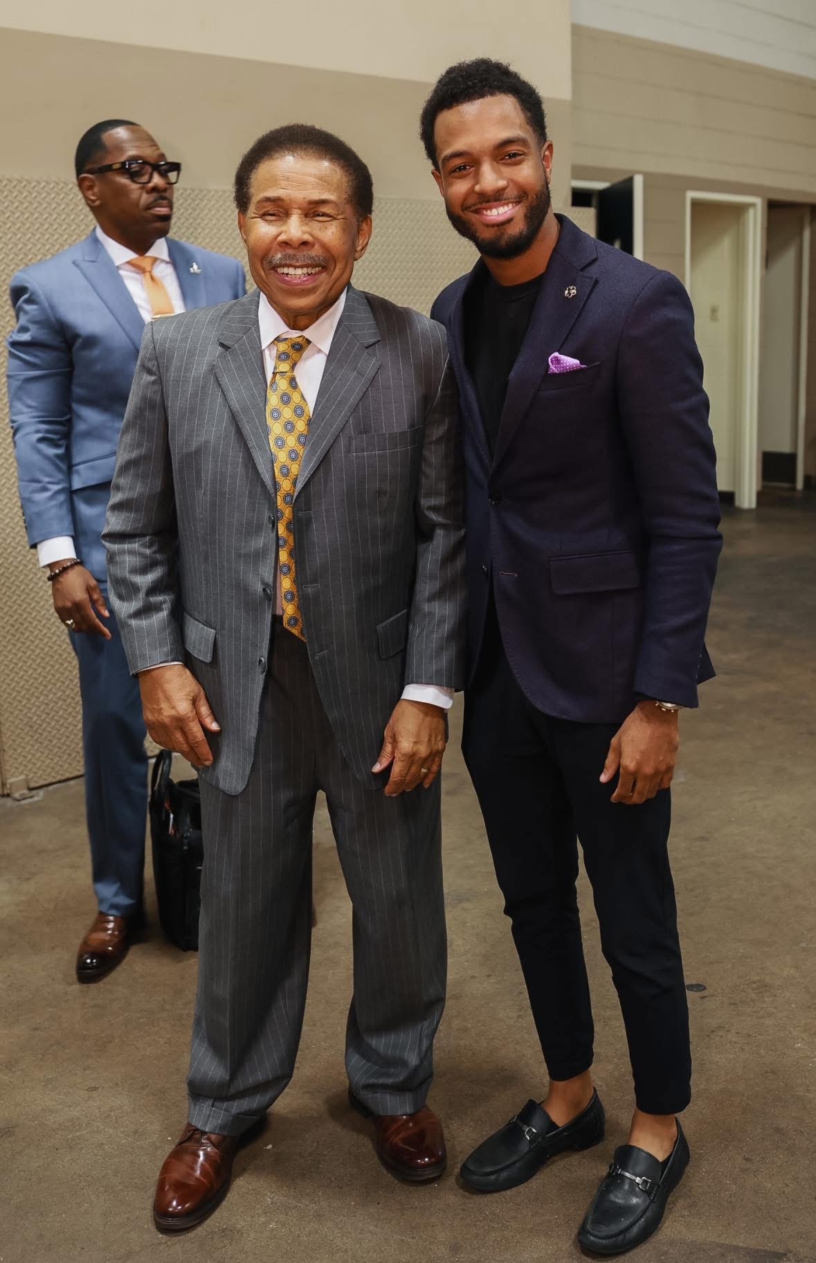 Davon with a senior bishop after service